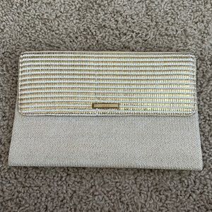 Stella and Dot cream & good clutch